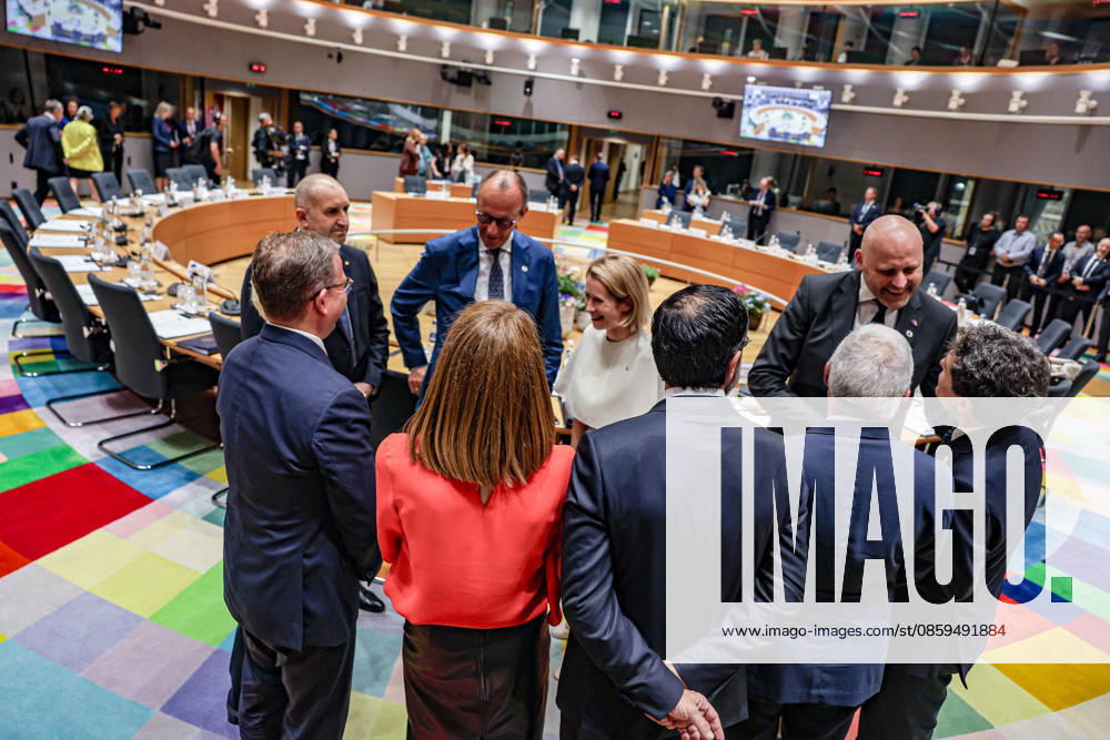 Clockwise from left, KAJA KALLAS, EU High Representative for Foreign Affairs and Security Policy; ANDRIS KULBERGS, Prime Minister of Latvia; NICUSOR DAN, President of Romania; ANTONIO COSTA, President of the European Council; LUIS MONTENEGRO, Prime Minister of Portugal; ROBERTA METSOLA, President of the European Parliament; KRISTEN MICHAL, Prime Minister of Estonia; RUMEN RADEV, Prime Minister of Bulgaria; and FRIEDRICH MERZ, Chancellor of Germany, speak in a circle ahead of a roundtable meeting inside the European Council during the European Council Summit in Brussels. Brussels European Union - ZUMAo116 20260618_znp_o116_130