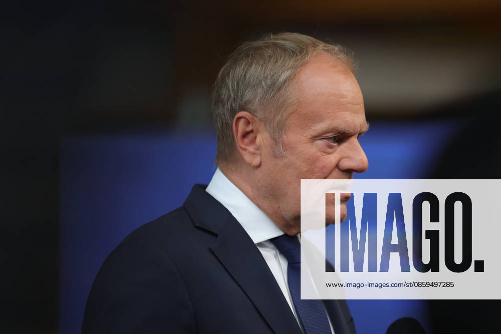 DONALD TUSK, Prime Minister of Poland, arrives to speak to the press ahead of a roundtable meeting during the European Council Summit in Brussels. Poland is expected to focus on European defence readiness, security along the EUâ€⠢s eastern flank, competitiveness, Ukraine and the EUâ€⠢s next long-term budget. Brussels European Union - ZUMAo116 20260618_znp_o116_137