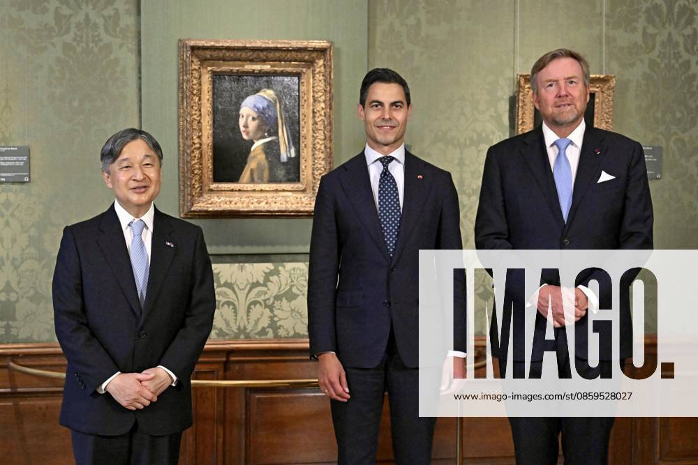 Japan s emperor in The Hague (From L) Emperor Naruhito of Japan, Dutch Prime Minister Rob Jetten and King Willem-Alexander of the Netherlands pose for a photo in front of Johannes Vermeer s Girl with a Pearl Earring at the Mauritshuis in The Hague, the Netherlands, on June 18, 2026, during the emperor s state visit. A14AA0005619443P
