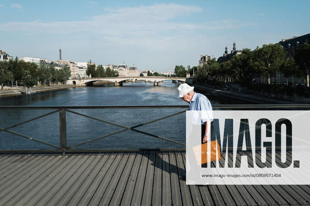 The Heat Wave Is Increasing In Paris An elderly man wearing a hat walks across the Pont des Arts in Paris, France, on June 19, 2026. A heatwave affects France and is expected to continue for several days, with temperatures anticipated to reach up to 40?C in some areas on June 21, the first day of summer. Paris France