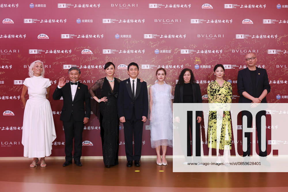 Jury members actor Tony Leung Chiu-wai and his wife Carina Lau Kar-ling, producer Dora Bouchoucha Fourati, director Guan Hu, director Aktan Abdykalykov, director-screenwriter Dea Kulumbegashvili, screenwriter Fernanda Valadez and actress Xin Zhilei arrive at the red carpet of the closing ceremony for the 28th Shanghai International Film Festival on June 20, 2026 in Shanghai, China.