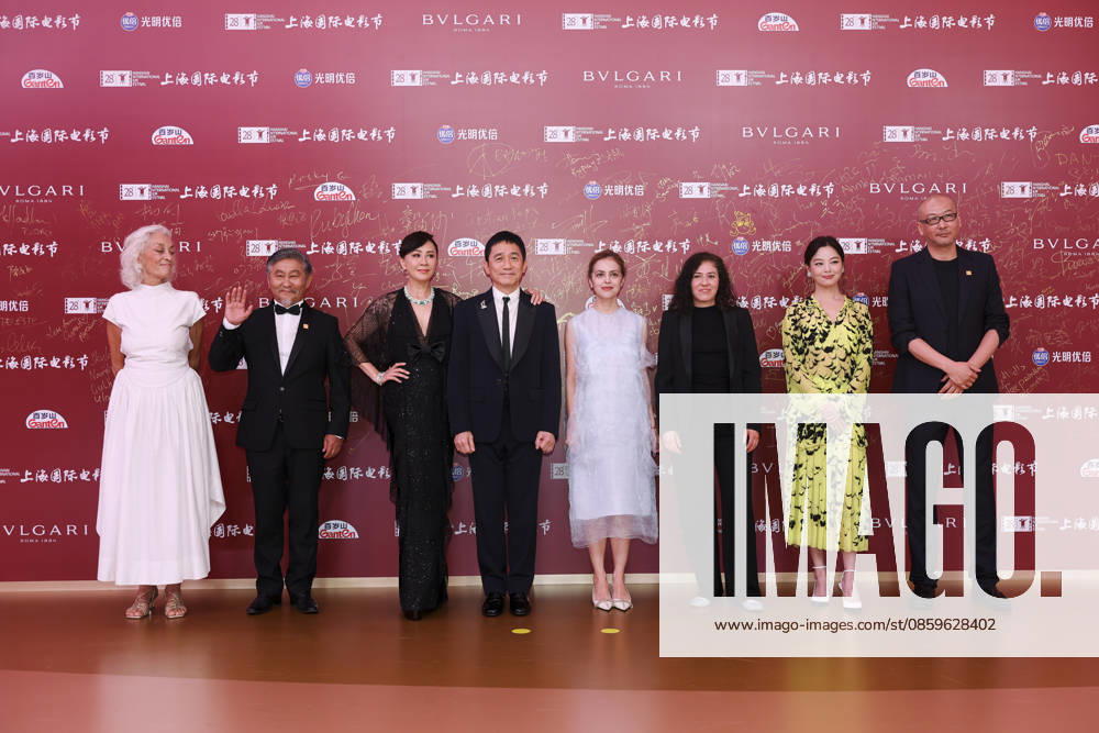 Jury members actor Tony Leung Chiu-wai and his wife Carina Lau Kar-ling, producer Dora Bouchoucha Fourati, director Guan Hu, director Aktan Abdykalykov, director-screenwriter Dea Kulumbegashvili, screenwriter Fernanda Valadez and actress Xin Zhilei arrive at the red carpet of the closing ceremony for the 28th Shanghai International Film Festival on June 20, 2026 in Shanghai, China.