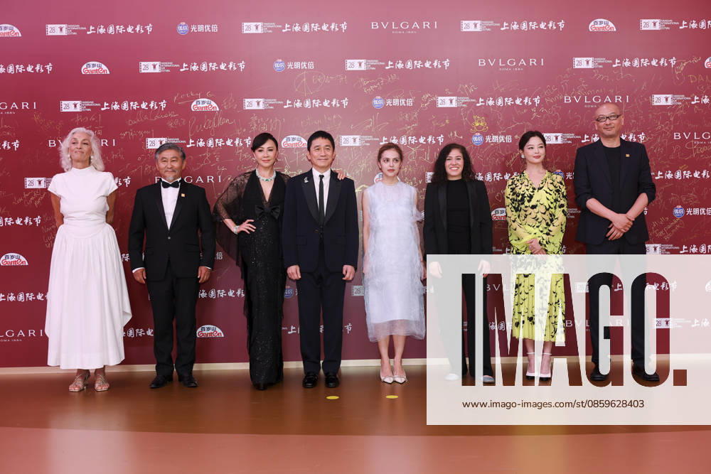 Jury members actor Tony Leung Chiu-wai and his wife Carina Lau Kar-ling, producer Dora Bouchoucha Fourati, director Guan Hu, director Aktan Abdykalykov, director-screenwriter Dea Kulumbegashvili, screenwriter Fernanda Valadez and actress Xin Zhilei arrive at the red carpet of the closing ceremony for the 28th Shanghai International Film Festival on June 20, 2026 in Shanghai, China.