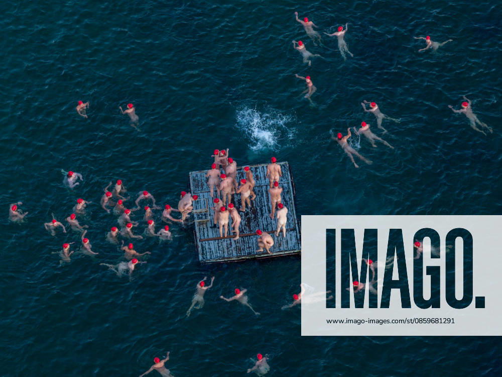 DARK MOFO WINTER SOLSTICE SWIM HOBART, Swimmers participate in the annual nude winter solstice swim during Hobart s Dark Mofo festival at Long Beach in Hobart, Monday June 22, 2026. ( NO ARCHIVING HOBART TAS AUSTRALIA