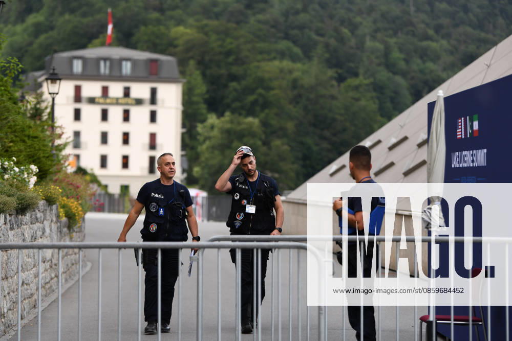 (260622) -- BURGENSTOCK, June 22, 2026 -- Police officers walk out of a hotel complex to the media center in Burgenstock near Lucerne, Switzerland, June 21, 2026. The Iranian delegation left negotiations with the United States in Switzerland on Sunday in protest of U.S. President Donald Trump s threat to launch further strikes against Iran, Iran s semi-official Tasnim news agency reported. ) (SpotNews) SWITZERLAND-BURGENSTOCK-U.S.-IRAN TALKS LianxYi