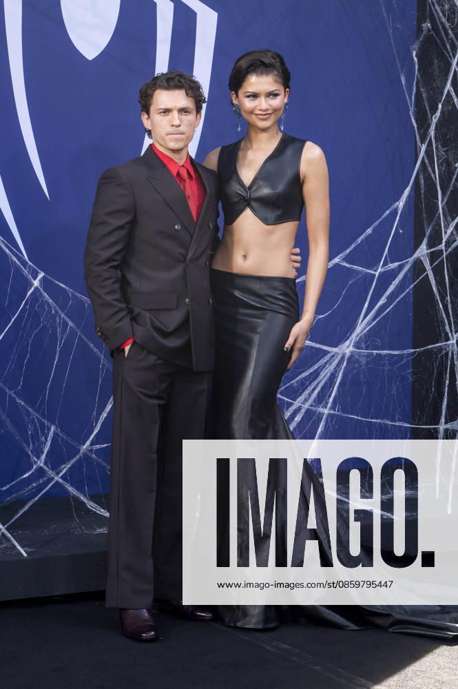 ABB SPIDER-MAN Tom Holland, a British actor, and his girlfriend, U.S. actress Zendaya, appeared on the black carpet at the German fan event for Spider-Man