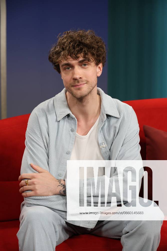 Timon Krause, mentalist, author, mind reader, and hypnotist, appeared as a guest on the television show *DAS Rote Sofa*, a live talk show produced by Norddeutscher Rundfunk (NDR); photo op on June 26, 2026, at the NDR television studio in Hamburg-Lokstedt