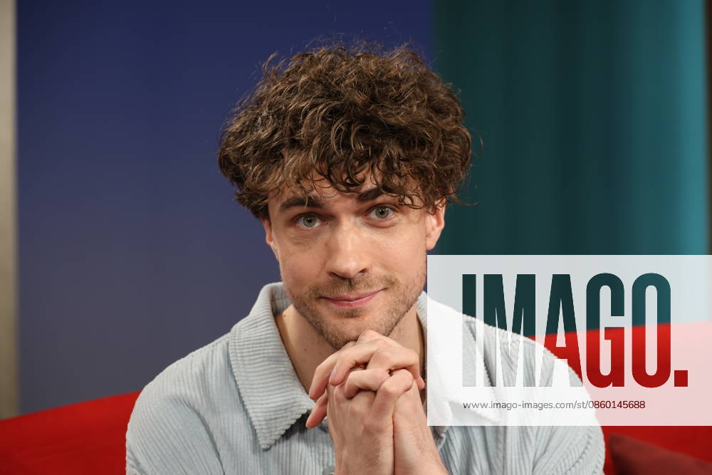 Timon Krause, mentalist, author, mind reader, and hypnotist, appeared as a guest on the television show *DAS Rote Sofa*, a live talk show produced by Norddeutscher Rundfunk (NDR); photo op on June 26, 2026, at the NDR television studio in Hamburg-Lokstedt