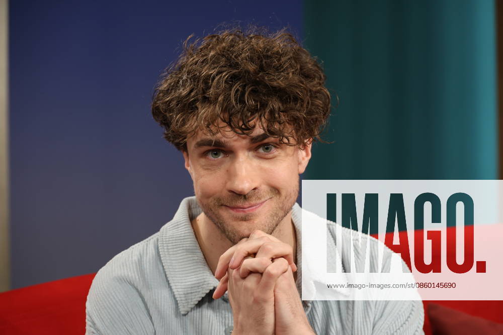 Timon Krause, mentalist, author, mind reader, and hypnotist, appeared as a guest on the television show *DAS Rote Sofa*, a live talk show produced by Norddeutscher Rundfunk (NDR); photo op on June 26, 2026, at the NDR television studio in Hamburg-Lokstedt
