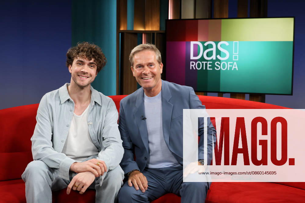 Timon Krause, mentalist, author, mind reader, and hypnotist, appearing on the TV show *DAS Rote Sofa*, a live talk show on Norddeutscher Rundfunk; on the right is host Hinnerk Baumgarten, Photo op on June 26, 2026, at the NDR television studio in Hamburg-Lokstedt