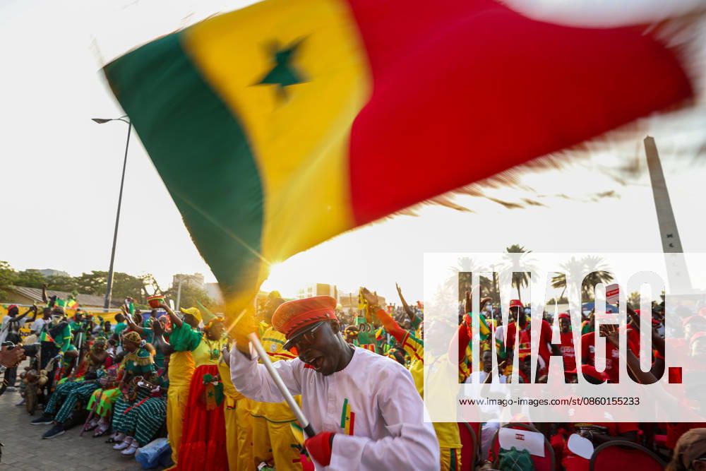 Senegal fans celebrate national team s World Cup victory in Dakar DAKAR, SENEGAL - JUNE 27: A Senegalese fan watches the FIFA World Cup match between Senegal and Iraq on giant screens set up at Place de la Nation, where supporters celebrate Senegal s 5-0 victory over Iraq, in Dakar, Senegal, on June 27, 2026. Cem Ozdel Anadolu Dakar Senegal. Editorial use only. Please get in touch for any other usage.