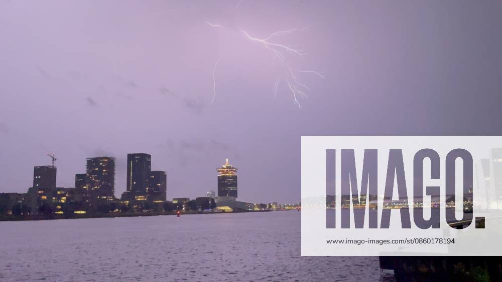 Amsterdam The Netherlands 26th June 2026 A spectacular electric storm passes over Het Ij waterway in the centre of the city making an end to the heatwave of the past week. het weer, weather, wetter, lightning, thunder, onweer,