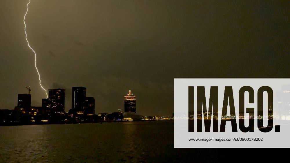 Amsterdam The Netherlands 26th June 2026 A spectacular electric storm passes over Het Ij waterway in the centre of the city making an end to the heatwave of the past week. het weer, weather, wetter, lightning, thunder, onweer,