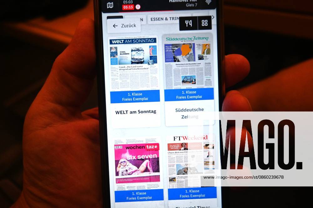 DB Deutsche Bahn, ICE night train from Munich to Hamburg. Display on smartphone. First-class passengers can read newspapers online for free via the ICE Portal. The ICE Portal is not an app that can be downloaded, but rather a website. It offers passengers entertainment options, travel information, and menus.