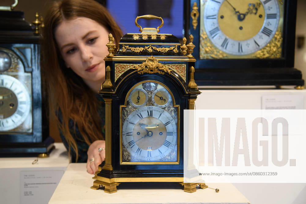 Bonhams Classics Week Sales at Bonhams, London, UK - 29 June 2026 A staff member views A fine and rare mid 18th century silver- and ormolu-mounted, quarter repeating ebony table clock of small size and wonderful proportion - Barkley and Colley, Graham s Successors, London (est. Â£25k - Â£35k) which is part of Bonhams Classics Week Sales on 30th June - 2nd July at Bonhams, London, England, UK on Monday 29 June, 2026., Credit:Justin Ng Avalon UK, England, London, Bonhams