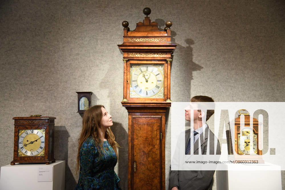 Bonhams Classics Week Sales at Bonhams, London, UK - 29 June 2026 A staff member views An exceptional early 18th century burr walnut month-going longcase clock - Thomas Tompion, London, No. 385 (est. Â£150k - Â£250k) which is part of Bonhams Classics Week Sales on 30th June - 2nd July at Bonhams, London, England, UK on Monday 29 June, 2026., Credit:Justin Ng Avalon UK, England, London, Bonhams