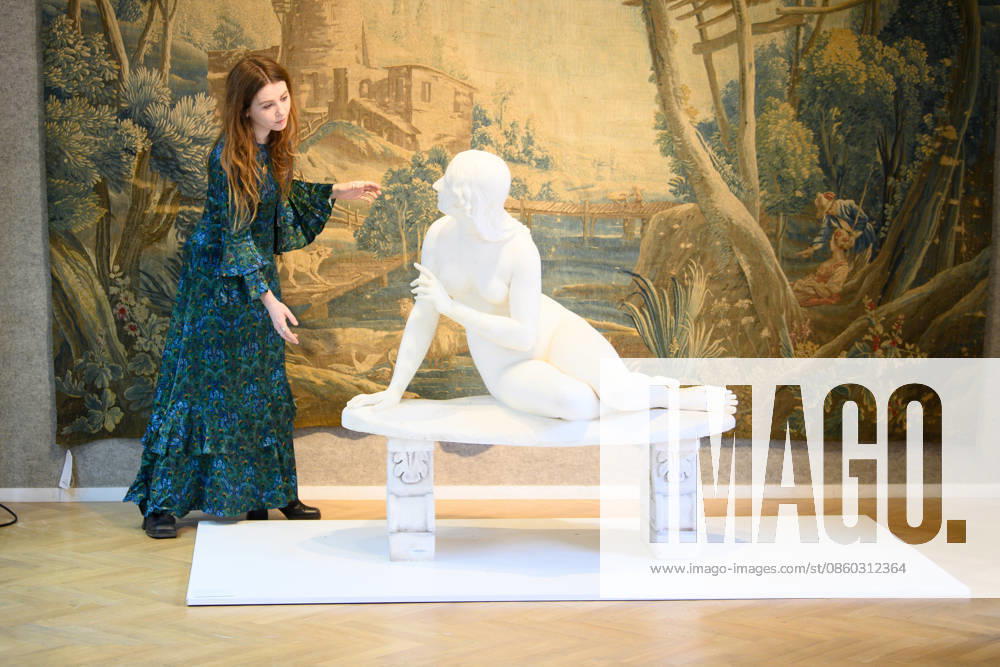 Bonhams Classics Week Sales at Bonhams, London, UK - 29 June 2026 A staff member views (background) - A Louis XV Aubusson pastoral tapestry - Mid 18th Century (est. Â£3k - Â£4k) and (foreground) A carved white marble figure of Eve listening to the voice of Adam by Edward Hodges Baily (est. Â£10k - Â£15k) which is part of Bonhams Classics Week Sales on 30th June - 2nd July at Bonhams, London, England, UK on Monday 29 June, 2026., Credit:Justin Ng Avalon UK, England, London, Bonhams