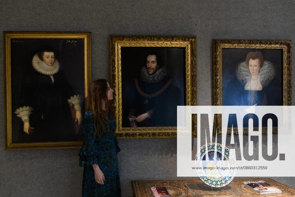 Bonhams Classics Week Sales at Bonhams, London, UK - 29 June 2026 A staff member views (L) - Portrait of a lady in a black silk dress, her ruff and cuffs edged in lace Attributed to Marcus Gheeraerts the Younger (est. £15k - £20k), (M) - Portrait of Catherine Howard, Countess of Nottingham, in a black dress decorated with white lace in a carved frame by Robert Peake the Elder (est. £150k - £200k) and (R) - Portrait of Thomas Howard, 14th Earl of Arundel, half length, in a black costume and white lace ruff, with the collar of the Garter and holding gloves in his left hand in a carved frame by Marcus Gheeraerts the Younger (est. £150k - £200k) which is part of Bonhams Classics Week Sales on 30th June - 2nd July at Bonhams, Lond
