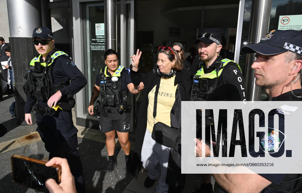 PRO PALESTINIAN PROTESTERS COURT, Activist Helen OSulivan (centre) is seen being detained by police as Pro-Palestinian protestors and Gaza flotilla members hold a rally outside court during a mention for dozens of people facing prohibited expression charges under new Queensland laws at Brisbane Magistrates Court, in Brisbane, Tuesday, June 30, 2026, ( NO ARCHIVING BRISBANE QUEENSLAND AUSTRALIA