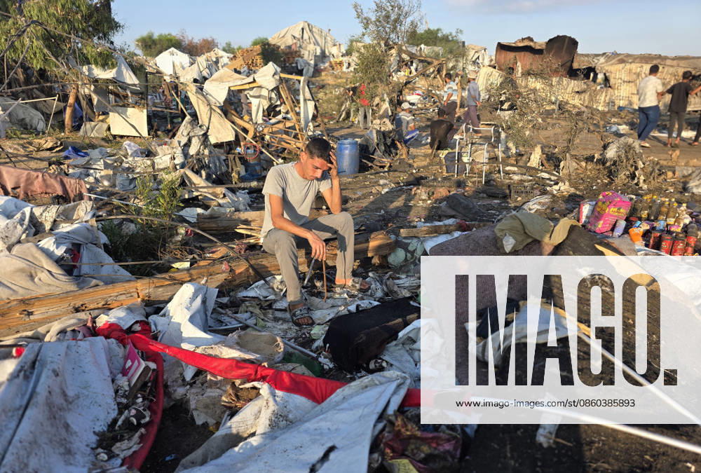 KW27 Displaced Families Inspect Damage After Israeli Airstrike in al-Mawasi Palestinian displaced families inspect damage to their tents and belongings following an Israeli airstrike that targeted a camp for displaced people in the al-Mawasi area of Khan Younis, southern Gaza Strip, on June 30, 2026. The Israeli army carried out the strike despite a ceasefire, causing extensive damage across the area. Photo by Tariq Mohammad APA Images Khan Yunis Gaza Strip Palestinian Territory 300626_Khan_Yunis_TM_00(14)