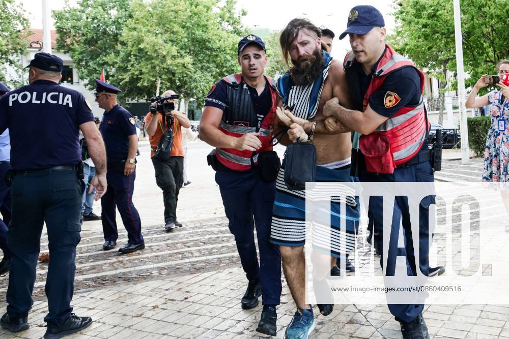 Police and Protesters Clash Outside Albanian Parliament TIRANA, ALBANIA JUNE 30, 2026: Demonstrators gathered outside the Albanian Parliament in Tirana during a new phase of the ongoing protests against a proposed luxury tourism development project linked to Jared Kushner. Protesters confronted lawmakers as they arrived for and departed from the parliamentary session, chanting slogans accusing members of parliament of failing to represent citizens and throwing eggs toward official vehicles. Police intervened after tensions escalated, using pepper spray and detaining several demonstrators during brief clashes outside the parliament building. The protest movement later continued with its daily evening demonstration outside the Prime Minis