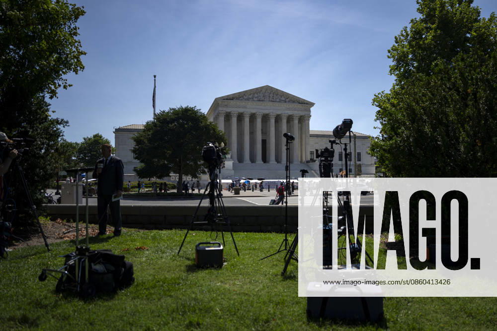 News teams set up outside the Supreme Court of the United States in Washington, DC as the court releases their final opinions before summer recess on Tuesday, June 30, 2026. The court upheld birthright citizenship, and also state laws banning transgender women and girls from playing on school athletic teams. WAP20260630435 BONNIExCASH