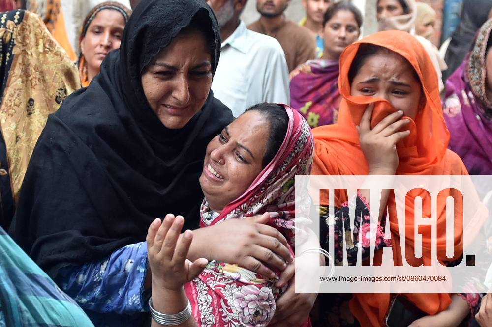 14 Children Killed In Lahore Tuition Center Roof Collapse Relatives weep and console one another following the collapse of a tuition center roof in Lahore, Pakistan, on June 30, 2026. Lahore Pakistan