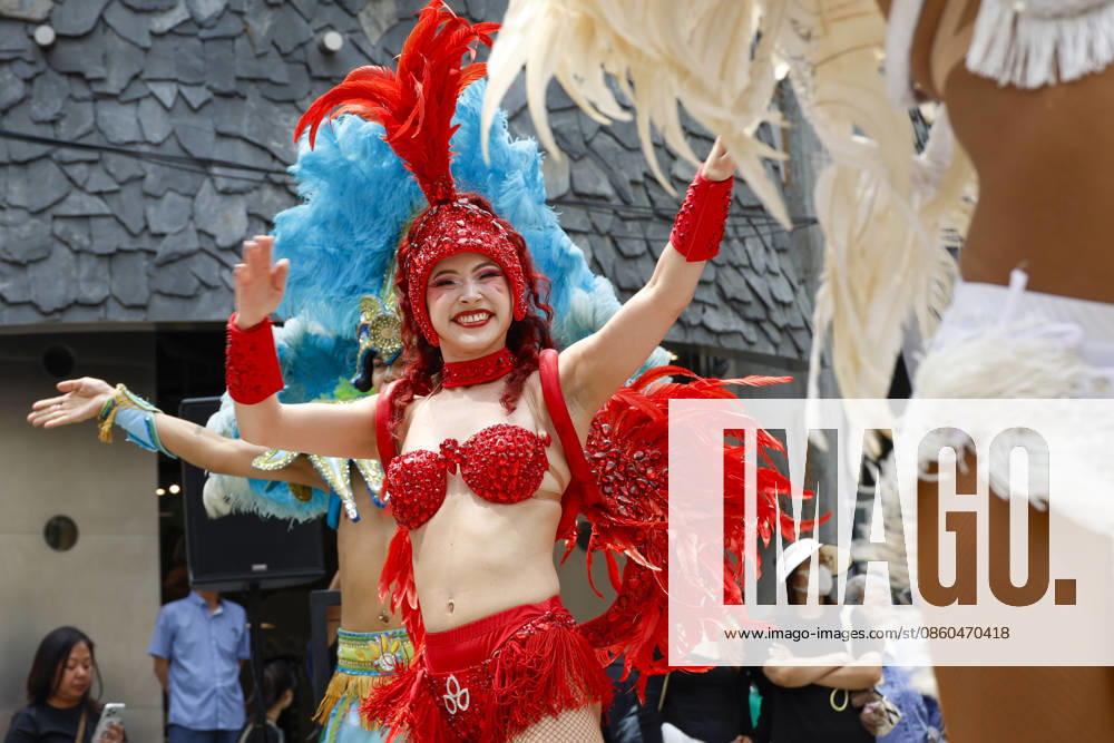 Dancers perform samba show summer festival in Seoul Dancers from Lotte World, a South Korean theme park, perform a samba show during a summer festival promotional event in the Myeongdong shopping district in Seoul, South Korea, on July 01, 2026. Seoul South Korea