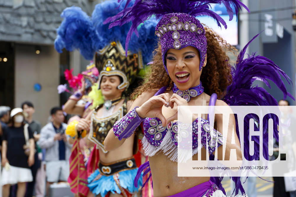 Dancers perform samba show summer festival in Seoul Dancers from Lotte World, a South Korean theme park, perform a samba show during a summer festival promotional event in the Myeongdong shopping district in Seoul, South Korea, on July 01, 2026. Seoul South Korea