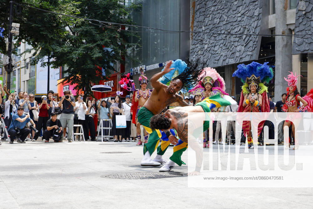 Dancers perform samba show summer festival in Seoul Dancers from Lotte World, a South Korean theme park, perform a samba show during a summer festival promotional event in the Myeongdong shopping district in Seoul, South Korea, on July 01, 2026. Seoul South Korea