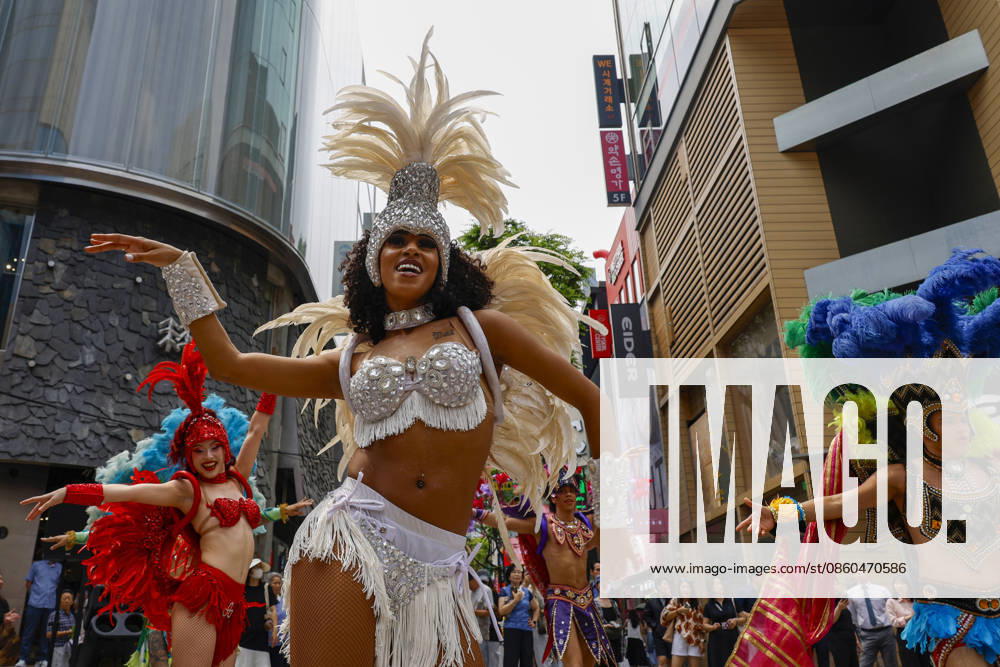 Dancers perform samba show summer festival in Seoul Dancers from Lotte World, a South Korean theme park, perform a samba show during a summer festival promotional event in the Myeongdong shopping district in Seoul, South Korea, on July 01, 2026. Seoul South Korea