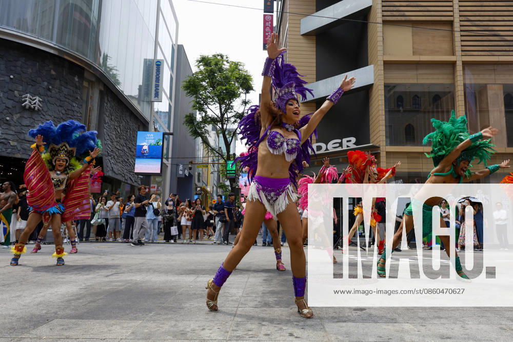 Dancers perform samba show summer festival in Seoul Dancers from Lotte World, a South Korean theme park, perform a samba show during a summer festival promotional event in the Myeongdong shopping district in Seoul, South Korea, on July 01, 2026. Seoul South Korea