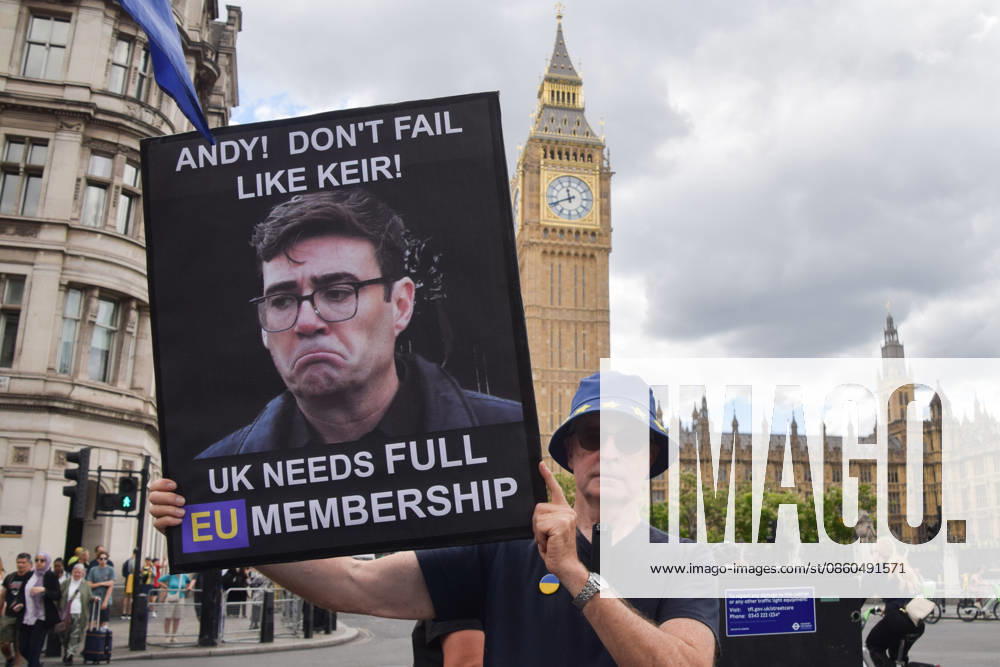 An activist holds a message for Andy Burnham, who is expected to take over as Prime Minister, during the weekly anti-Brexit and pro-EU protest in Parliament Square. London United Kingdom - ZUMAv130 20260701_zip_v130_013