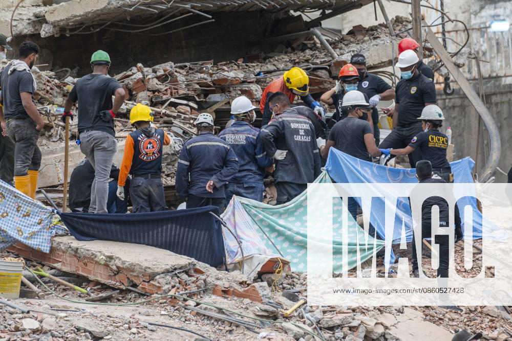 Firefighters, forensic police, and rescue workers continue searching for victims at the Santa Rita building in the San Bernardino parish of Caracas, Venezuela, on June 30, 2026, following two powerful earthquakes that caused widespread destruction across the city Caracas Altamira Miranda Venezuela