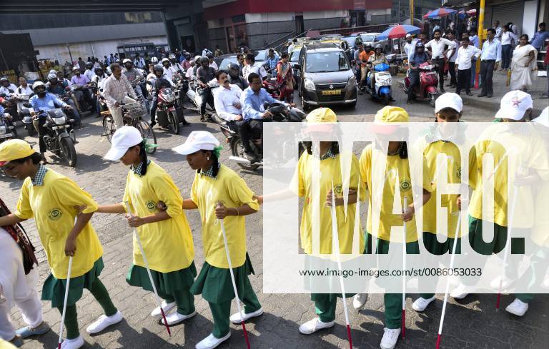 Around 30 students of Kamala Mehta Blind school of Dadar celebrate the World White Cane Safety Day and to create awareness along with Mumbai Police at Parel on October 15, 2018 in Mumbai, India. (Photo by Anshuman Poyrekar Hindustan Times) World White Cane Safety Day