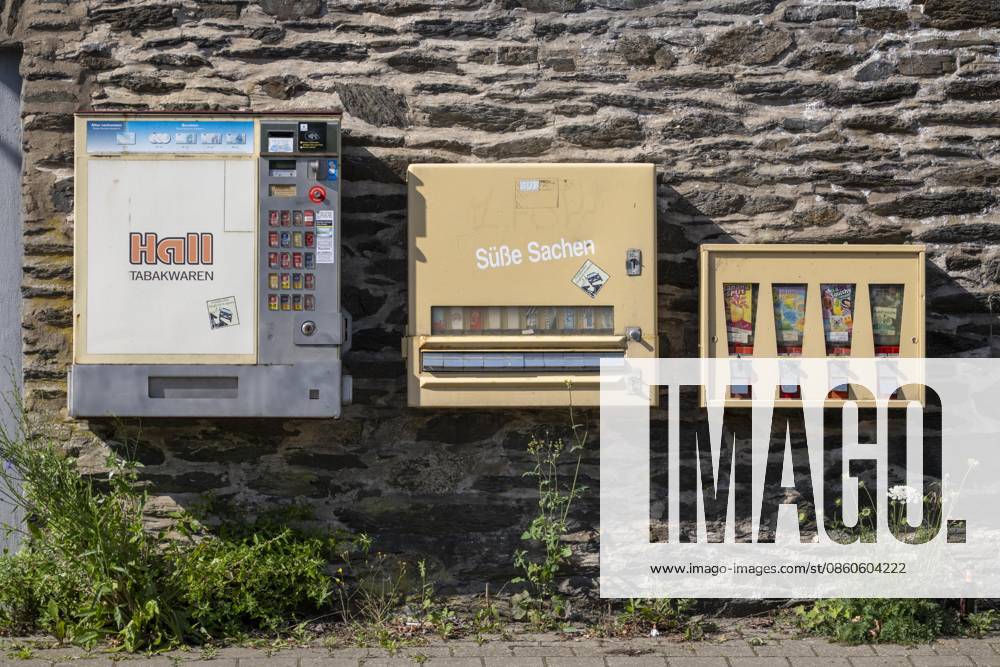 Vending machines, cigarette vending machine, candy vending machine, and on the right, a classic old gum vending machine; small items, toys; near St. Goar, Rhineland-Palatinate, Germany; vending machines