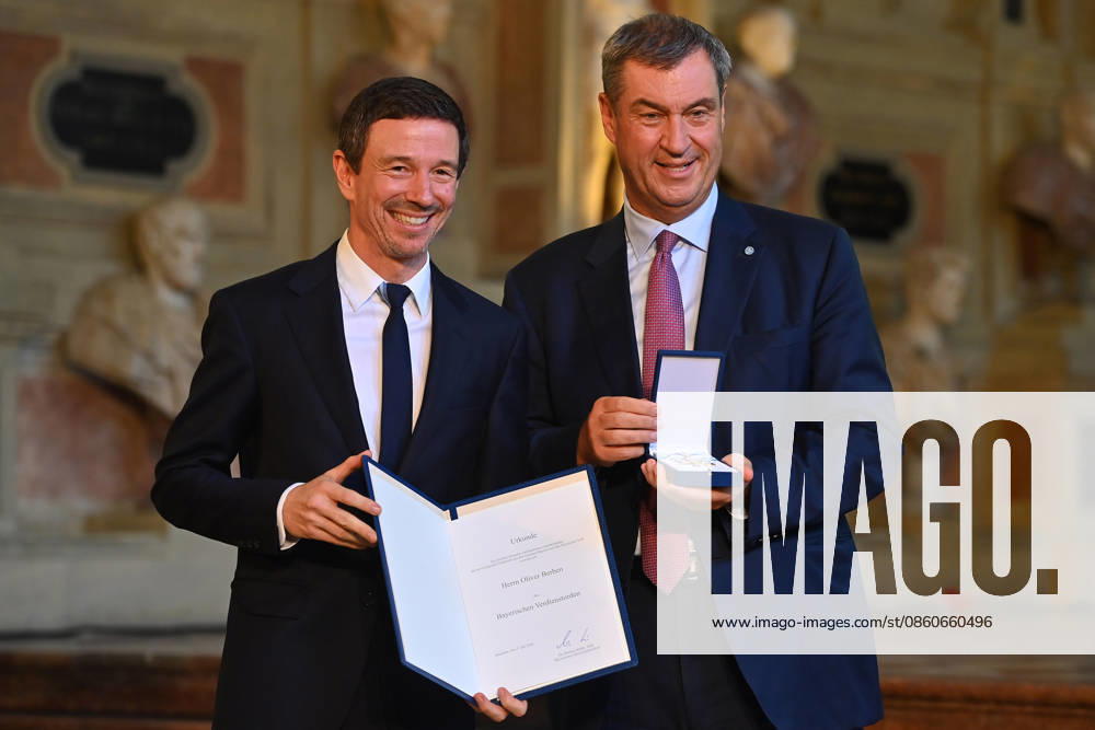 Oliver BERBEN receives the Bavarian Order of Merit from Markus SOEDER, Minister-President of Bavaria and CSU Chairman. The award ceremony for the Bavarian Order of Merit took place at the Antiquariat der Residenz in Munich on July 3, 2026.