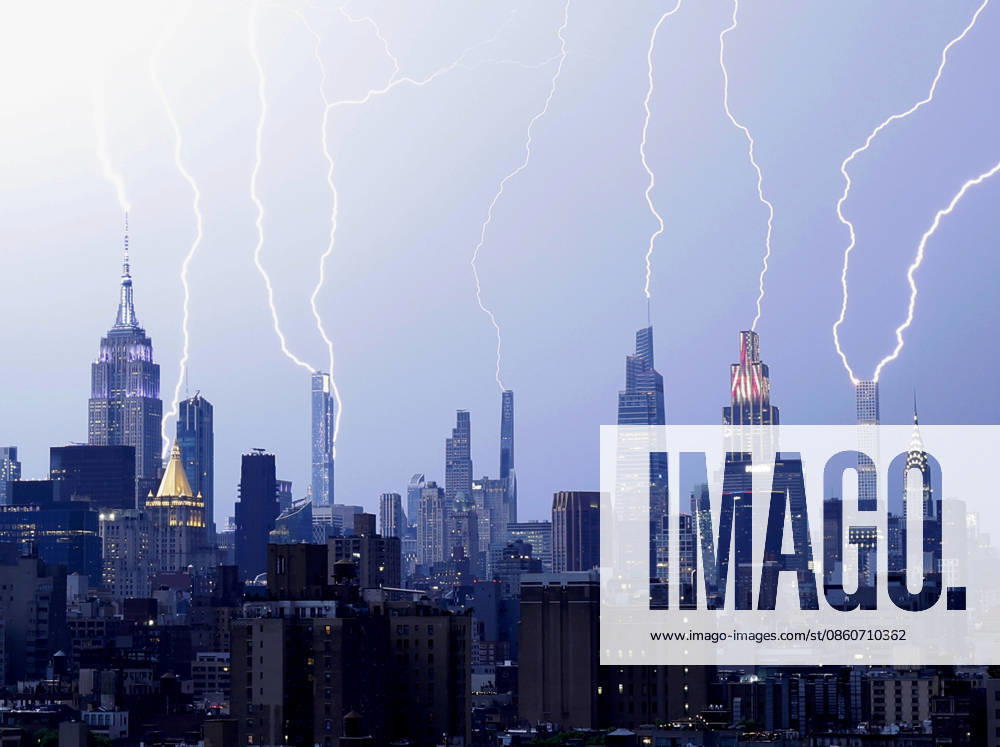 Bolts of lightning fill the Manhattan skyline and strike multiple skyscrapers including the Empire State Building and One Vanderbil in an early evening thunderstorm one day before the July 4th holiday and the 250th anniversary of the United States on Friday July 3, 2026 in New York City. NYP202607033008 JOHNxANGELILLO