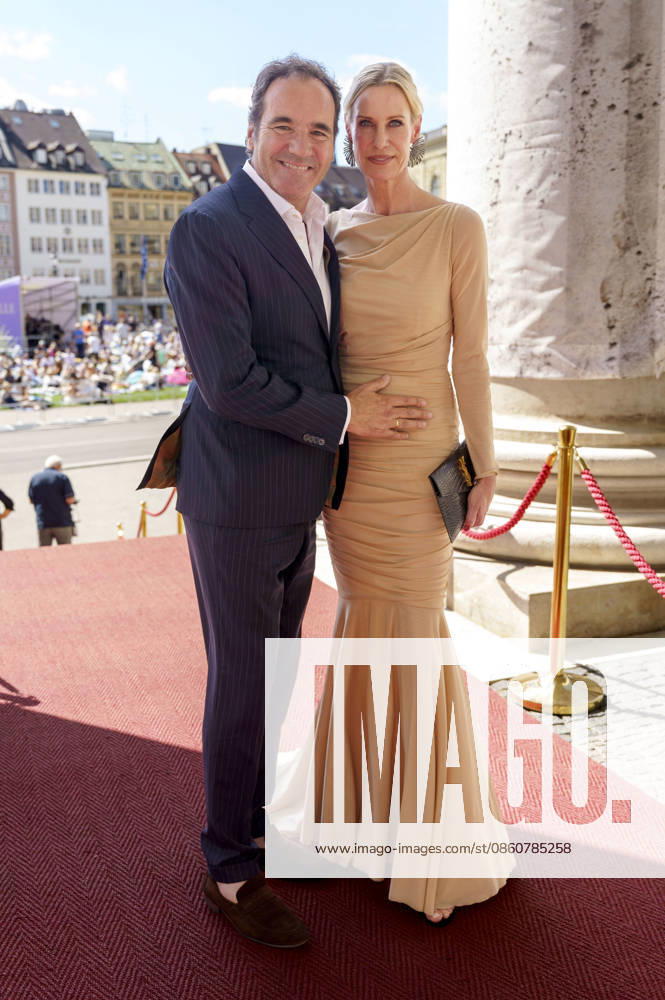 Thomas Ohrner with his wife Anne Arnholdt upon arrival at the Opera for All 2026 event, part of the Munich Opera Festival, featuring a live opera broadcast of Richard Wagner’s *Die Walküre* at the National Theater in Munich, July 4, 2026 Foto:xN.xKolinzx xFuturexImagex oper_6732