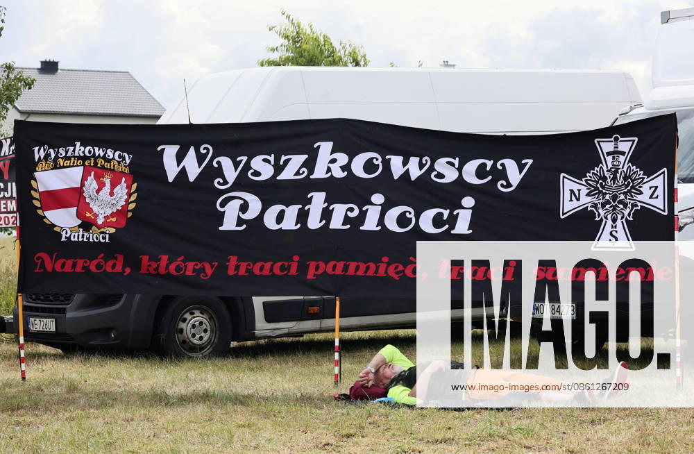 The 85th anniversary of the Jedwabne massacre Photo: Anita Walczewska East News, The 85th anniversary of the Jedwabne massacre, at 10 July 2026 in northeastern Poland. A tragedy took place on 1941 during the German occupation of Poland. Alternative commemorations were organized by the Movement for the Defense of Poles association and Grzegorz Braun?s Confederation of the Polish Crown, which questions the involvement of Poles in the pogrom. Pictured: A man is lying next to a banner that reads ?The Patriots of Wyszków. A nation that loses its memory loses its conscience? EN_01680706_0127