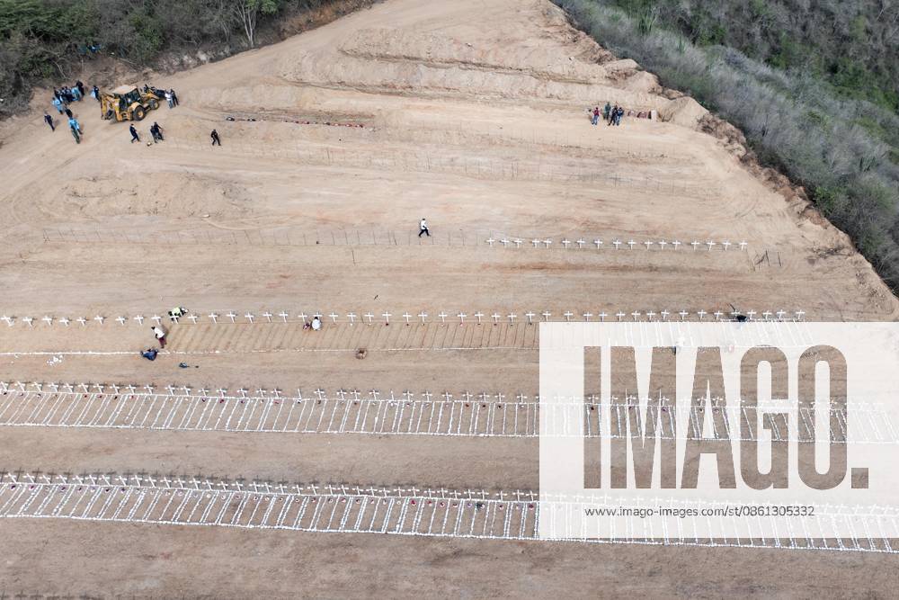 Emergency cemetery opens in Venezuela after deadly earthquakes LA GUAIRA, VENEZUELA - JULY 10: An aerial view of the mass grave at the La Esperanza Cemetery located along the highway connecting Catia La Mar and Carayaca, as it was opened under emergency measures following the June 24 earthquakes to bury the bodies of hundreds of people whose relatives could not be reached, in La Guaira, Venezuela on July 10, 2026. Alongside identified victims, hundreds of unidentified bodies were also laid to rest at the cemetery. Cem Tekkesinoglu Anadolu La Guaira Venezuela. Editorial use only. Please get in touch for any other usage.