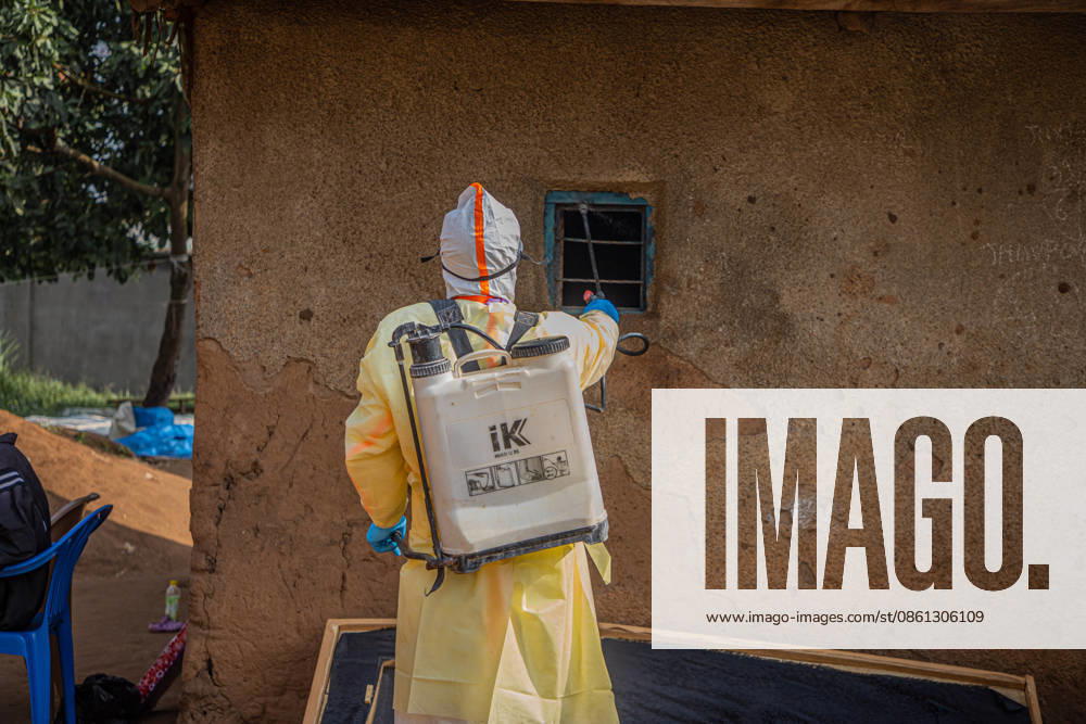 (260711) -- KINSHASA, July 11, 2026 -- A medical worker performs disinfection before burying a deceased person infected with the Ebola virus in Bunia, the capital of Ituri Province in the Democratic Republic of the Congo, July 9, 2026. The Ebola outbreak in the Democratic Republic of the Congo (DRC) remains in a very active phase and has yet to peak, health authorities said Thursday. DR CONGO-BUNIA-EBOLA OUTBREAK-EPIDEMIC CONTROL XinxHuashefa