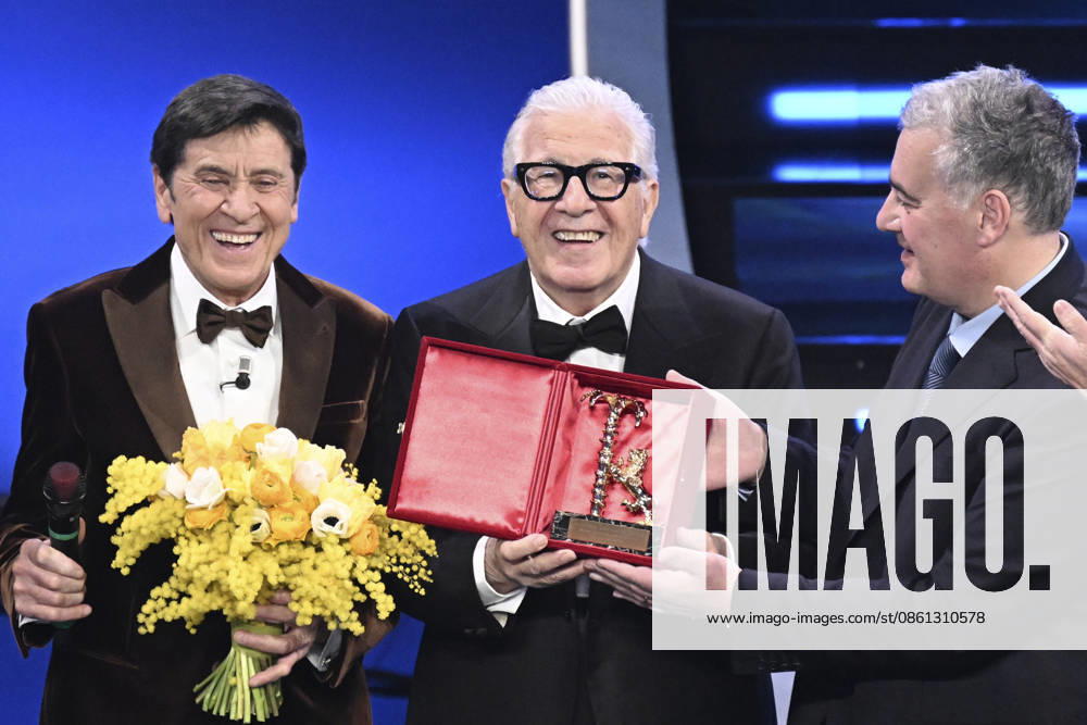 February 10, 2023, Sanremo. 73rd Italian Song Festival, fourth night. Pictured: Peppino Di Capri, Mayor of Sanremo, and Alberto Biancheri. Sanremo Italy - ZUMAa289 20230210_zia_a289_002