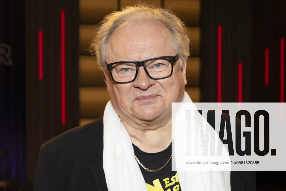 Singer and writer Heinz Rudolf KUNZE, friendly, smiling, wearing a white scarf, portrait, guest on the TV show Kölner Treff on WDR television, recorded on July 10, 2026, broadcast on August 7, 2026