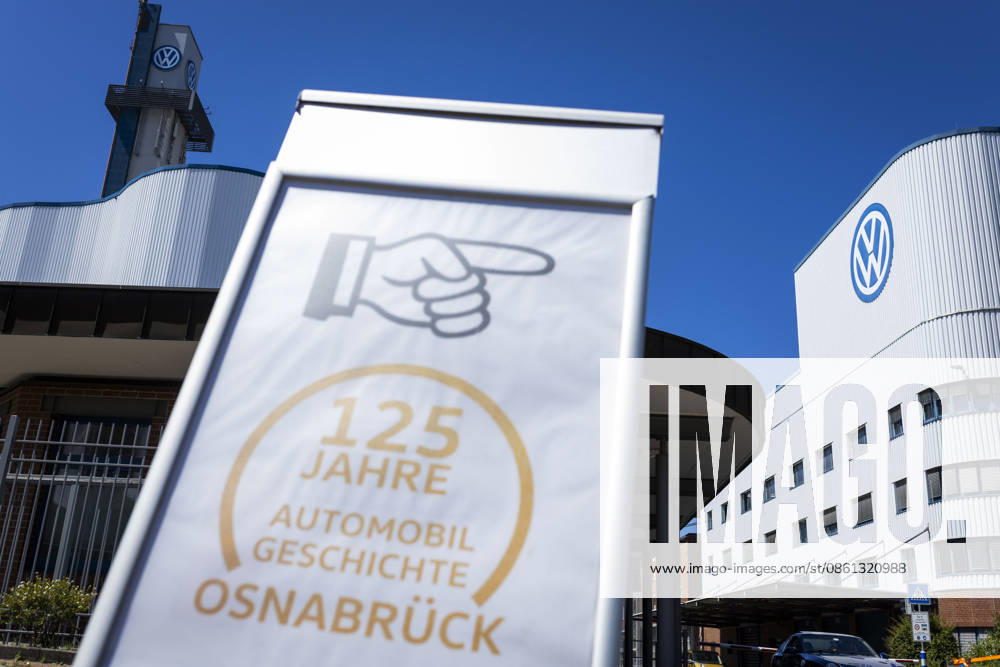 Sign marking 125 Years of Automotive History in Osnabrück in front of the VW plant in Osnabrück, July 11, 2026. Stock photo: VW Osnabrück