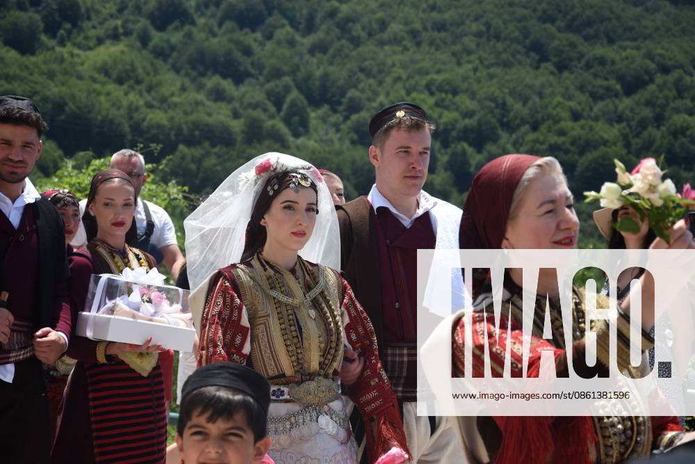 Traditional Galichnik Wedding in North Macedonia MAVROVO AND ROSTUSA, NORTH MACEDONIA - JULY 12: A view from centuries-old Galichnik Wedding, one of the Balkans most distinctive traditional wedding ceremonies, held in the historic mountain village of Galichnik, about 110 kilometers west of Skopje, in Mavrovo and Rostusa, North Macedonia, on July 12, 2026. The annual event, regarded as one of the country s most important cultural heritage traditions, attracts visitors from across North Macedonia and abroad. Medin Nuredini Anadolu Mavrovo and Rostusa North Macedonia. Editorial use only. Please get in touch for any other usage.