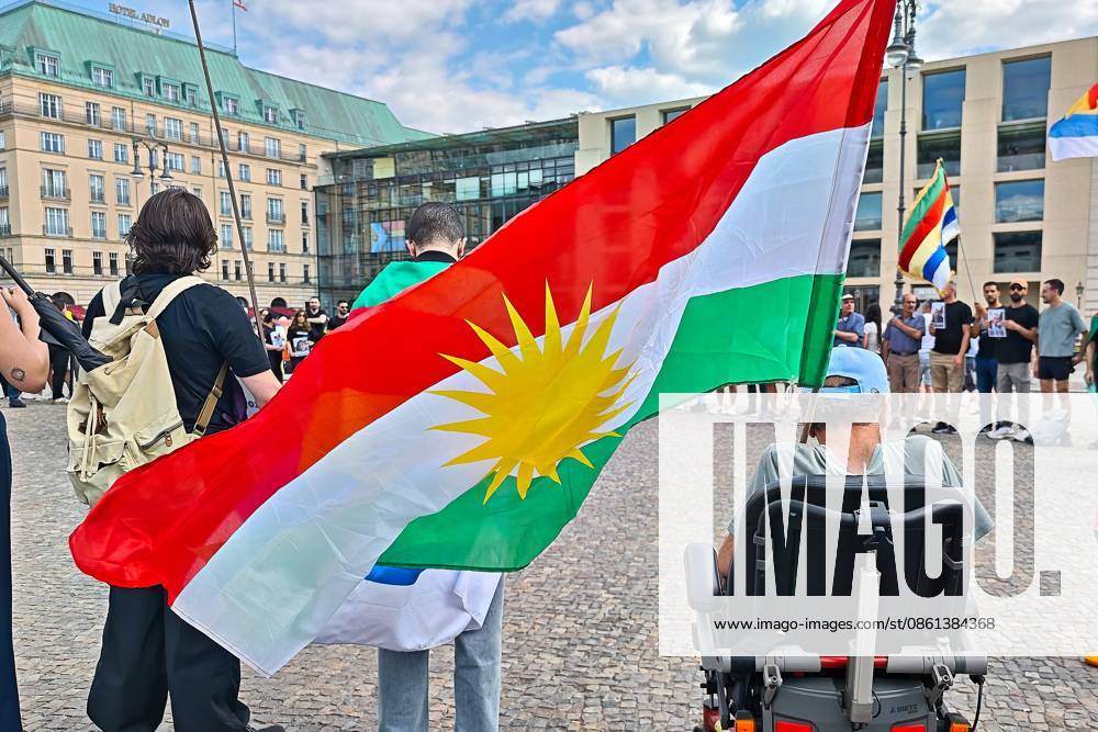Germany, July 12, 2026, Platz der Republik: To commemorate the first anniversary of the violent crimes committed against Druze protesters in Suwayda, southern Syria, demonstrators have gathered in front of the Brandenburg Gate