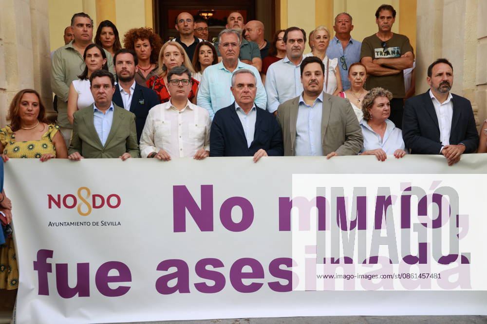 The Seville City Council calls for a minute of silence in response to the latest murder due to gender-based violence in Mijas, Málaga. The Seville City Council participates in the minute of silence called for in response to the latest murder due to gender-based violence in Mijas, Málaga, outside City Hall. July 13, 2026, in Seville, Andalusia, Spain. JULY 13, 2026. Rocí. Seville, Andalusia, Spain. Seville, Andalusia, Spain. Spain