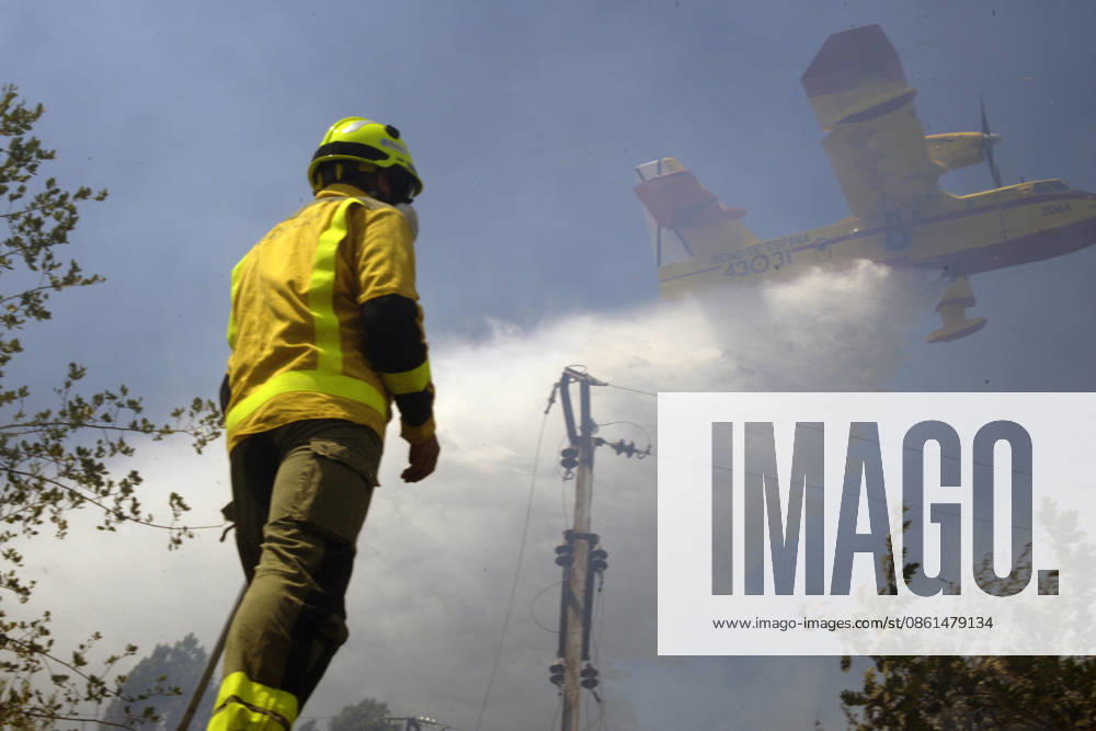 Forest Fire Reported in the Parish of Untes, Ourense Firefighters and a water bomber are working to extinguish the forest fire in Untes on July 13, 2026, in Untes, Ourense, Galicia, Spain. A wildfire that broke out in Untes has required the deployment of ground and air firefighting resources and the temporary closure of Highway N 120 to facilitate the work of emergency services. A thick column of smoke could be seen from the city of Ourense. JULY 13, 2026 Untes, Ourense, Galicia Untes, Ourense, Galicia, Spain