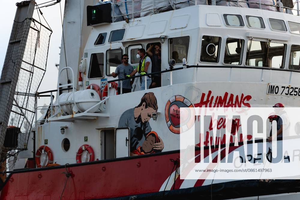 RAVENNA, ITALY - JULY 13, 2026 : The humanitarian vessel Open Arms, operated by the Spanish NGO of the same name, arrives at the port of Ravenna carrying 16 people rescued in the central Mediterranean, including seven unaccompanied minors. Disembarkation and initial reception procedures take place at the Fabbrica Vecchia quay in Marina di Ravenna, under the coordination of local authorities, medical personnel and organisations involved in migrant assistance. The arrival marks the first time the Open Arms has docked in the port of Ravenna. Ravenna Italy - ZUMAq101 20260713_zna_q101_189